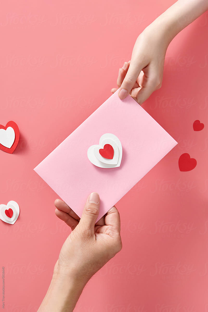 Giving love letters to each other Valentine\'s Day concept