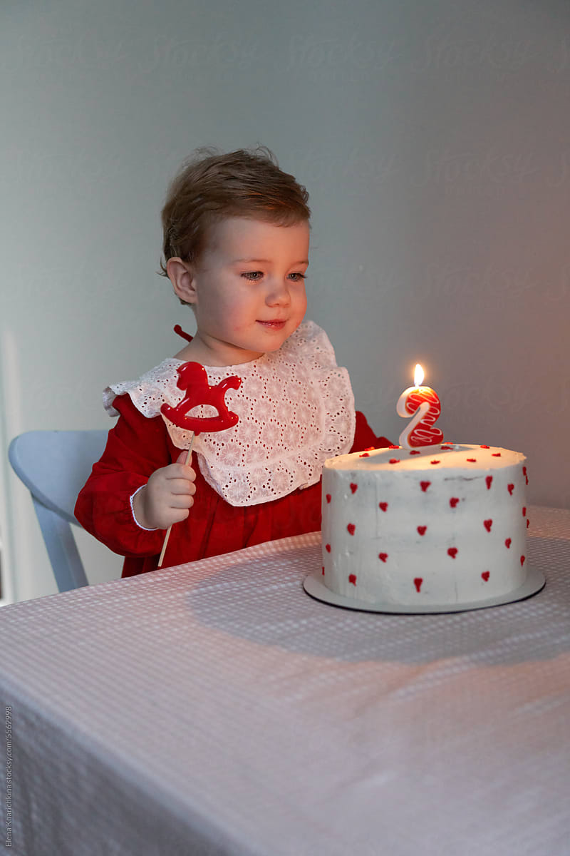 A Birthday Girl With A Cake