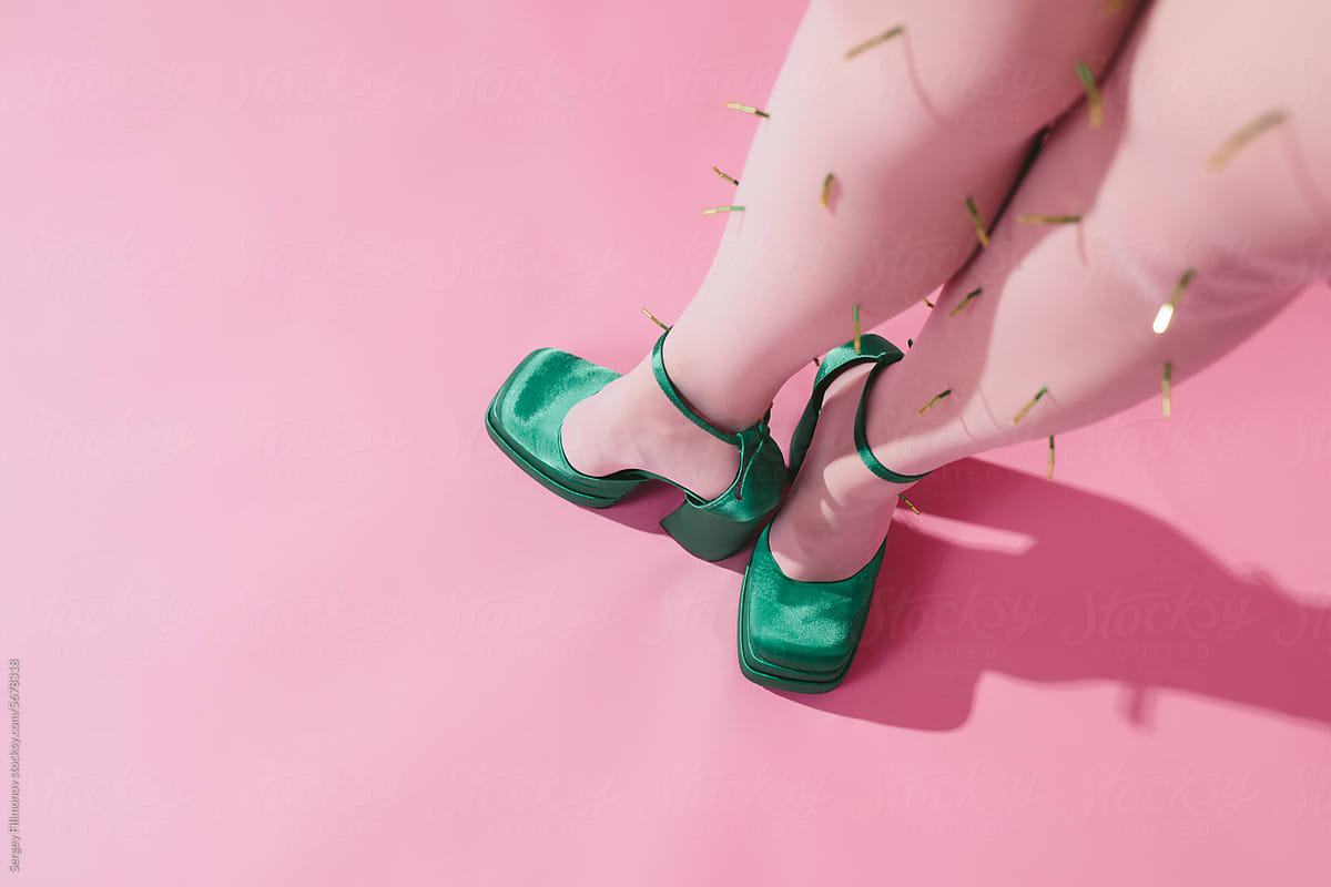 Colorful fashion - Woman legs in green shoes