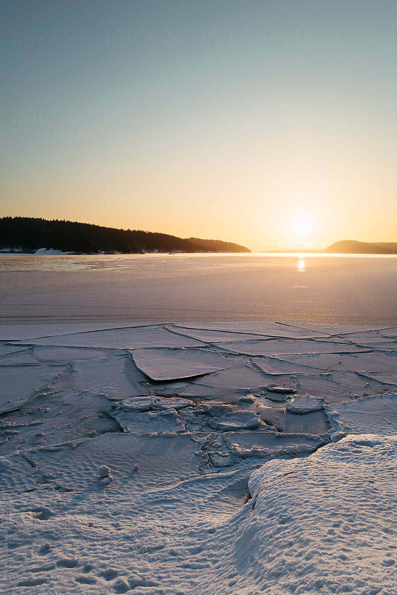Frozen pond at sunrise.