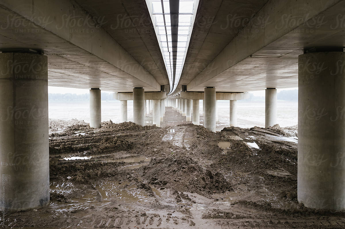 Mud under a highway bridge