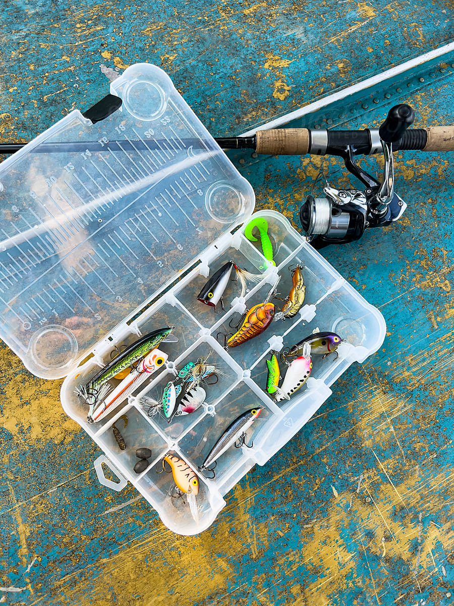 Fishing Rod and Plastic Tackle Box Still life