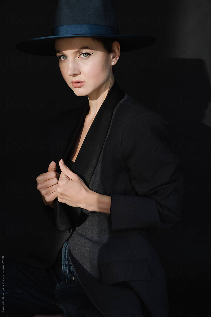 Charming Female Portrait In Black Background
