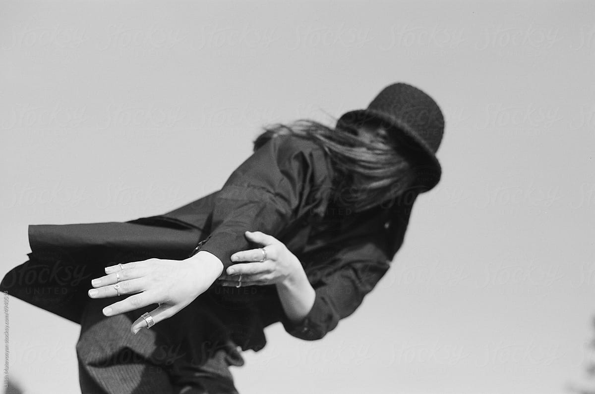 Dancing Girl in a black hat