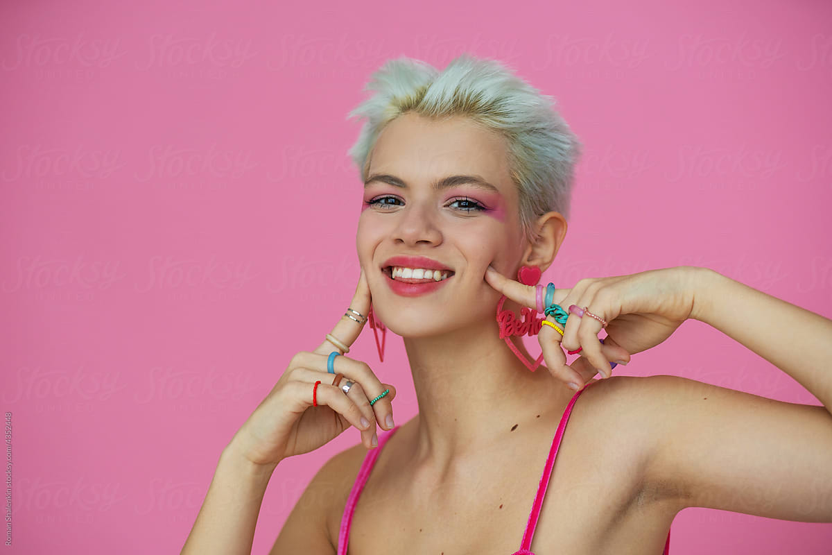Stylish female model with colorful makeup