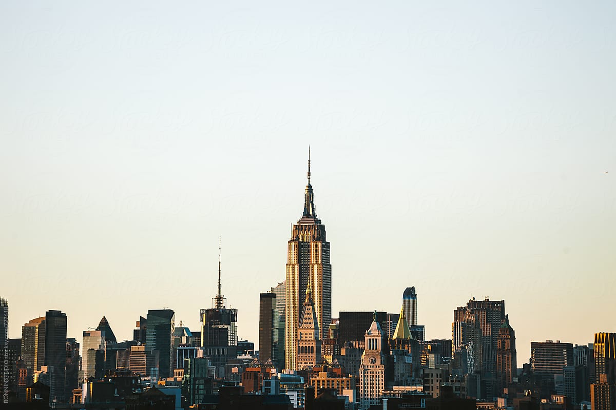 Views of the Empire State building at sunset.