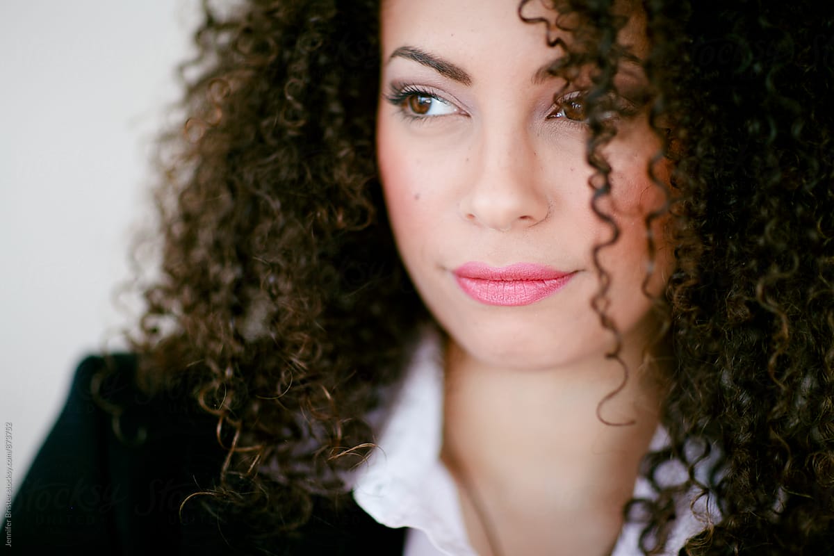 Close up of beautiful woman with curly hair