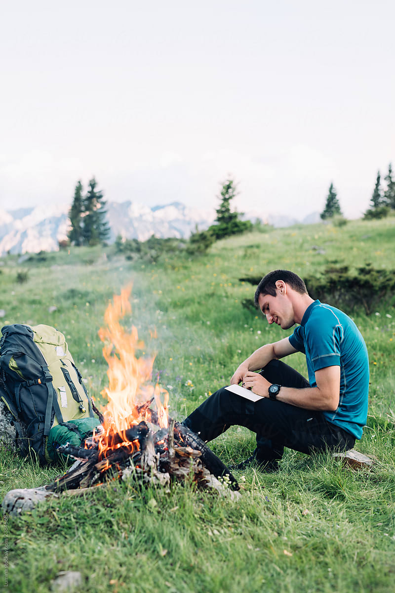 Hiker Sitting by the Fire