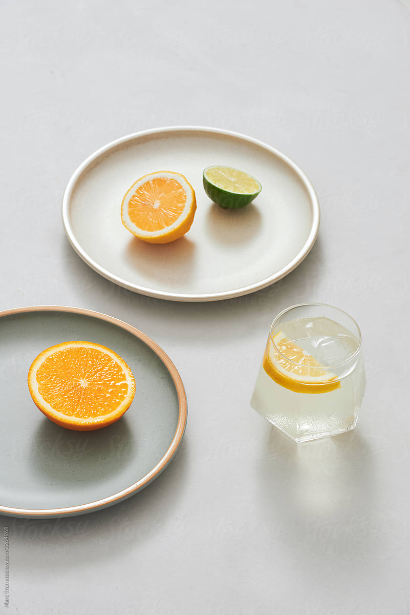 Fresh orange citrus fruit and water