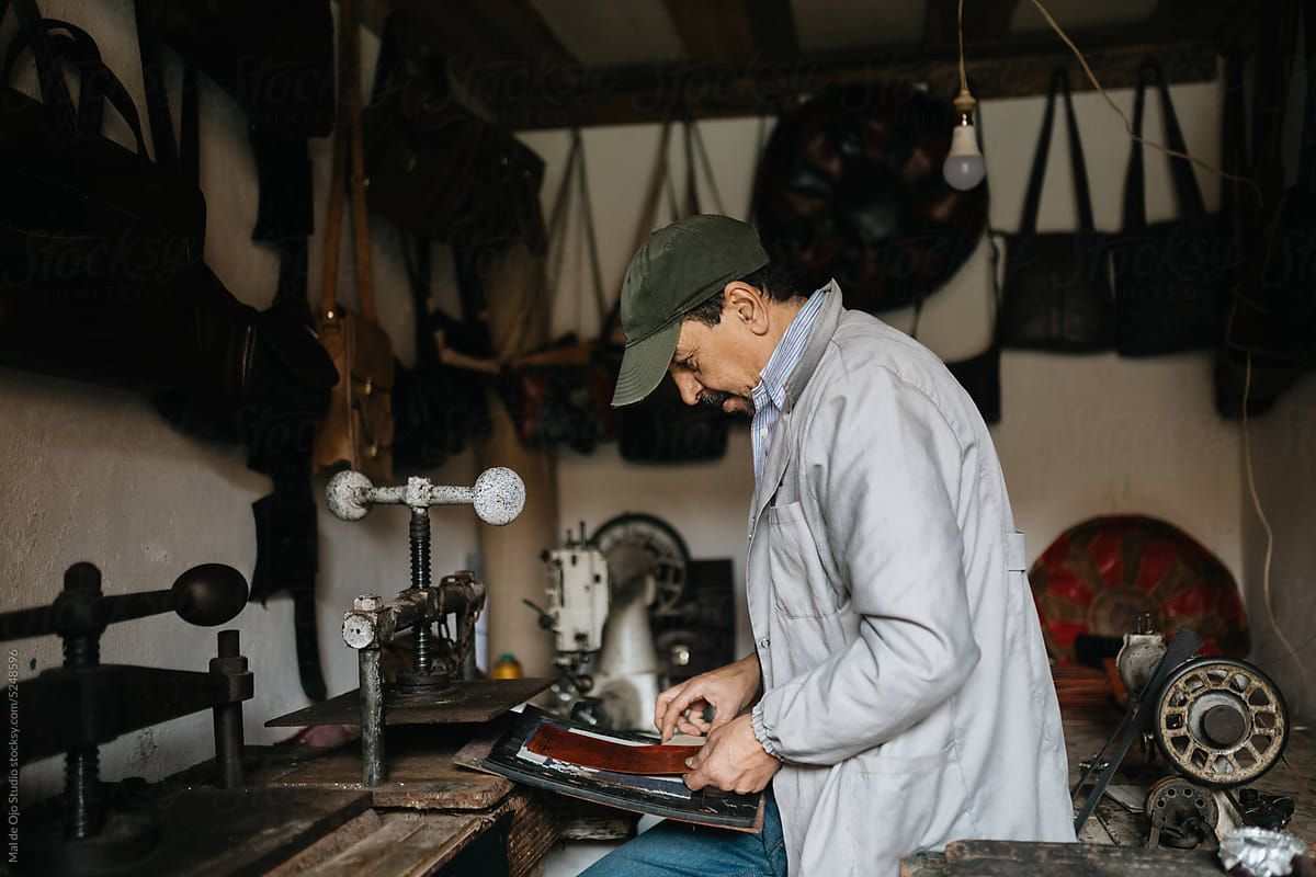 Leather artisan in his workshop