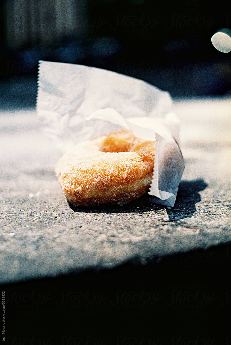 donut on the floor in the street, 35mm