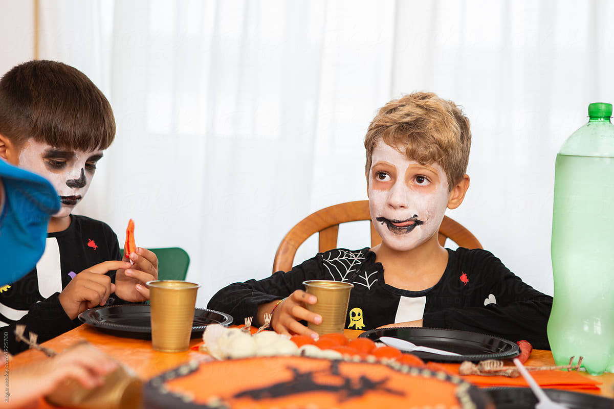 Kids at Halloween party food table