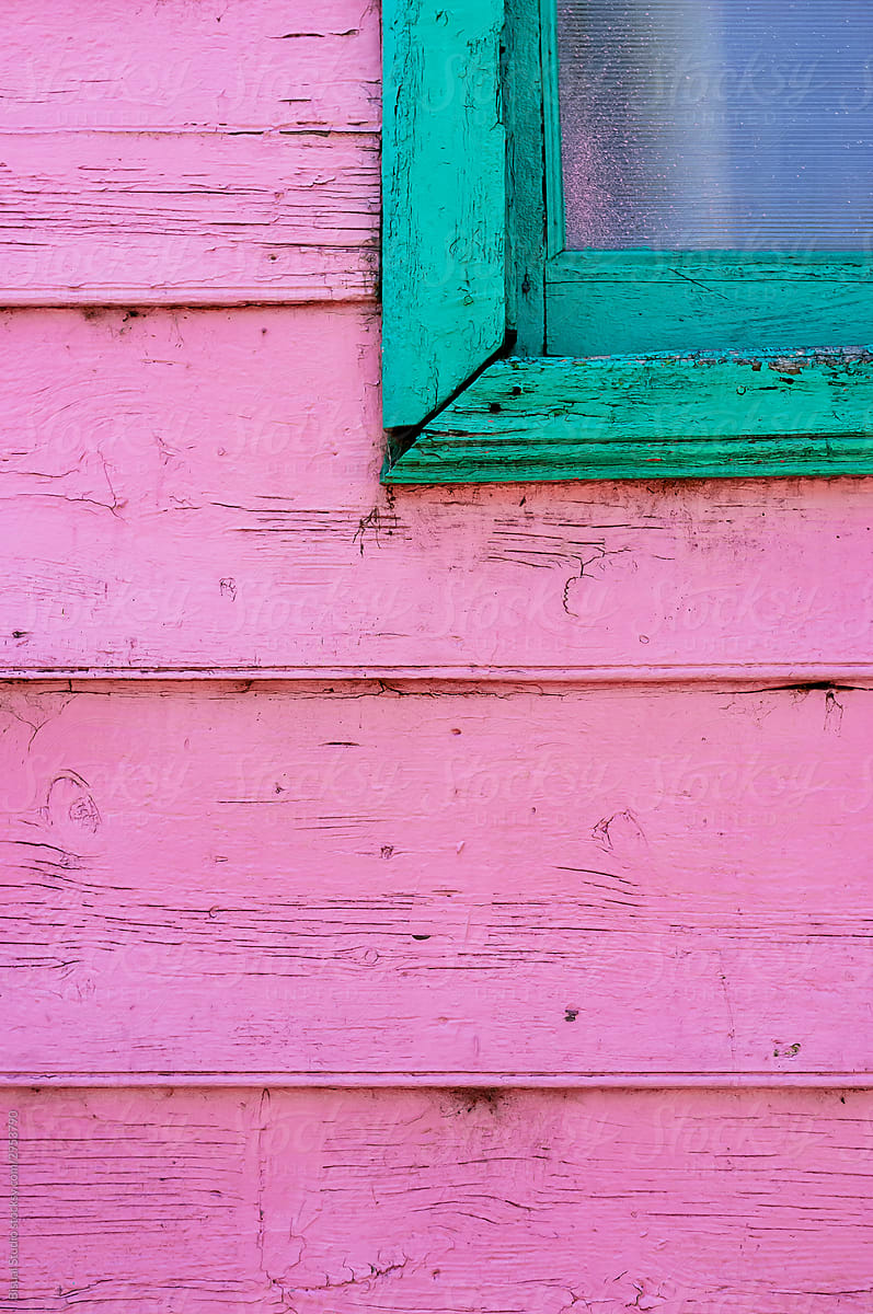 Pink and green window of a facade in Caminito street in Buenos Aires