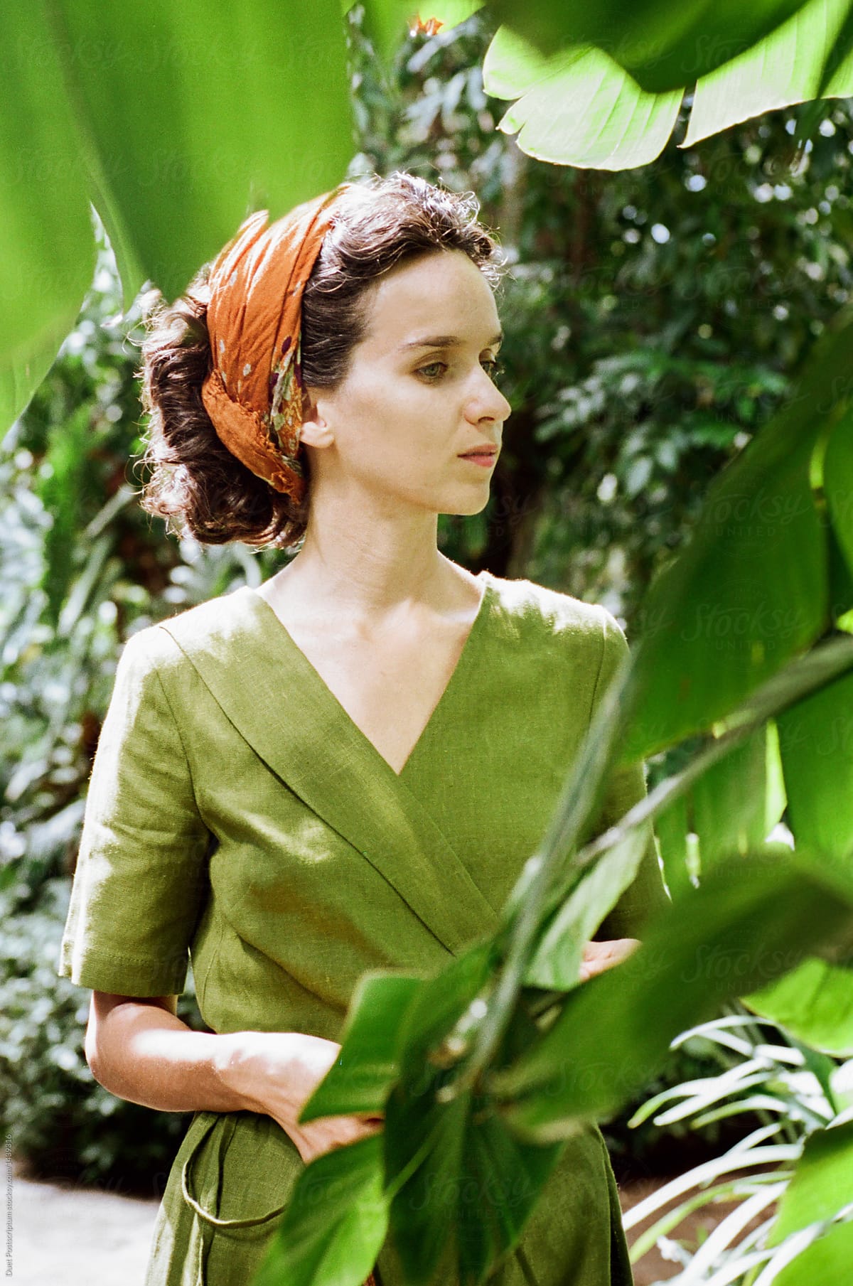 Woman posing in tropical garden