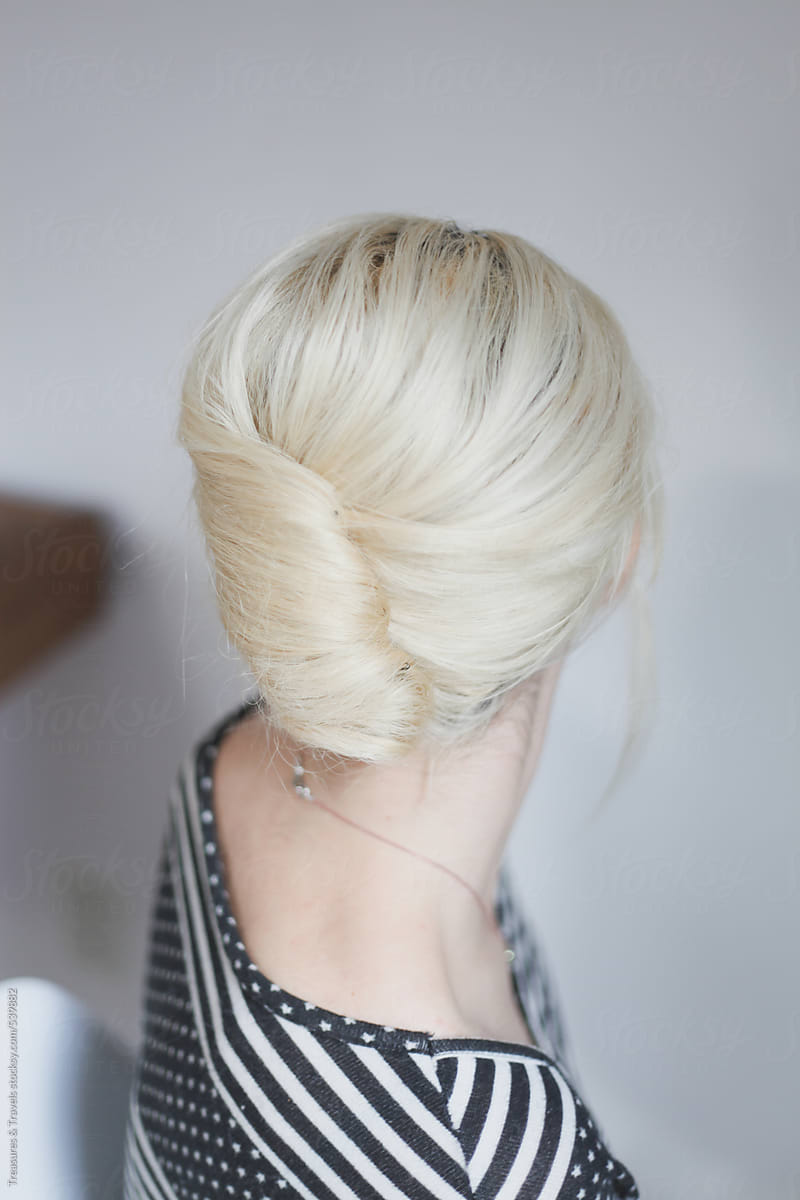 Back Of Woman S Hair In A French Roll Updo By Treasures