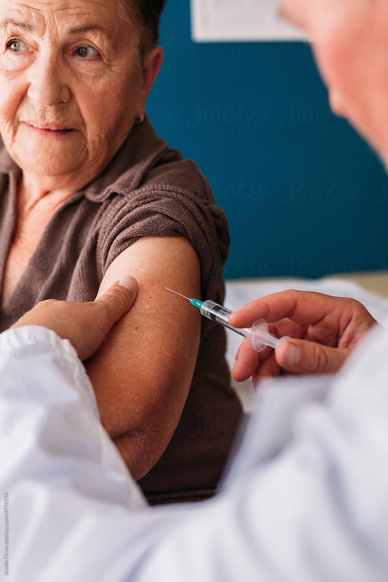 Elder Woman Getting Vaccine