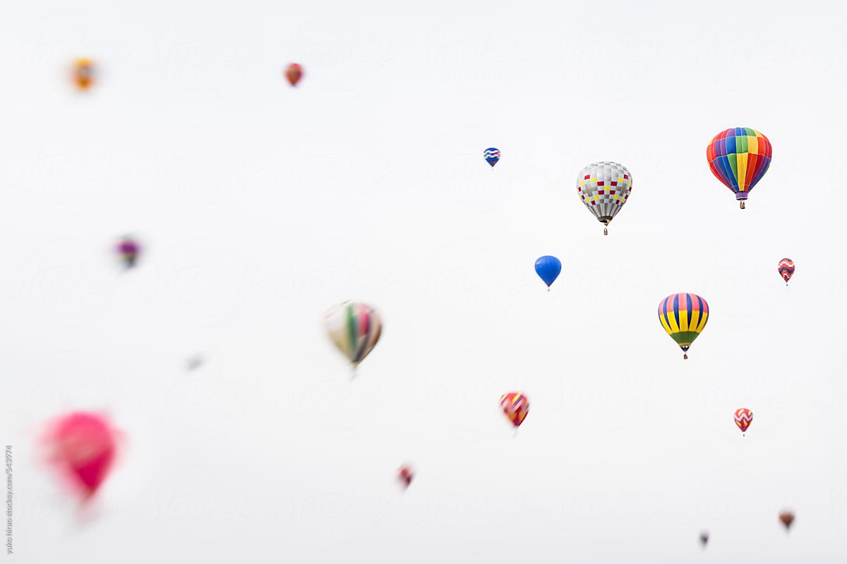 Colorful hot air balloon icons on white