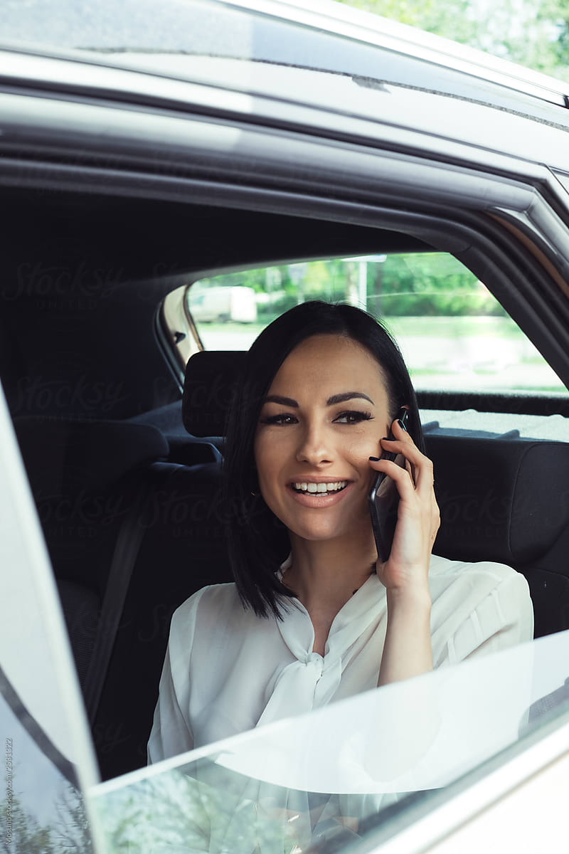 Modern Businesswoman in a Car