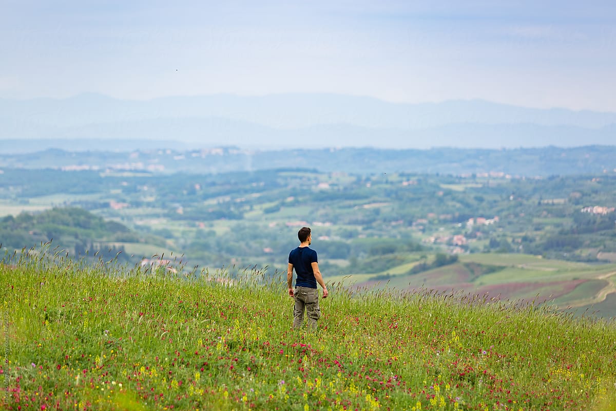 Young Contemplating Nature Over A Beautiful Italian Landscap by Giorgio Magini
