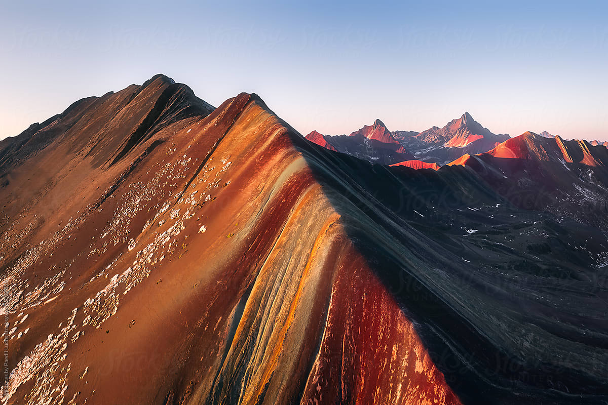 Rainbow mountain and red valley in the Peruvian highlands.