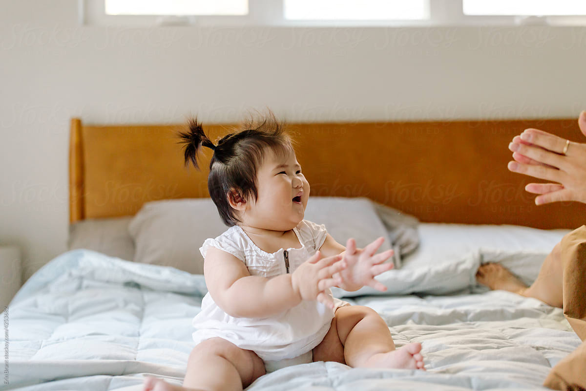 laughing asian baby