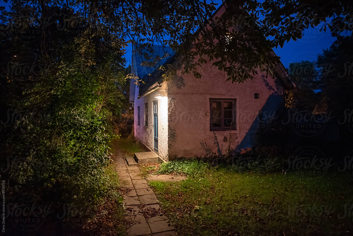 Old country house in village in evening