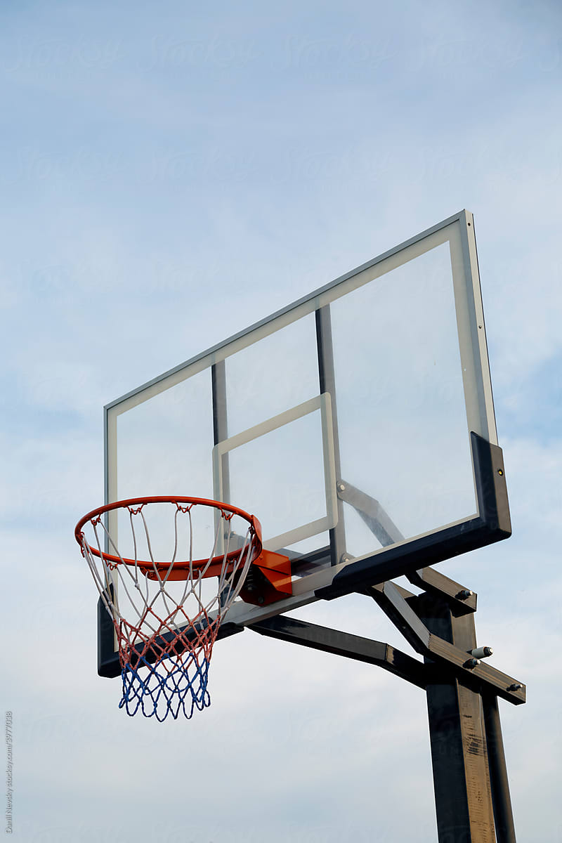 Backboard with ring on basketball court