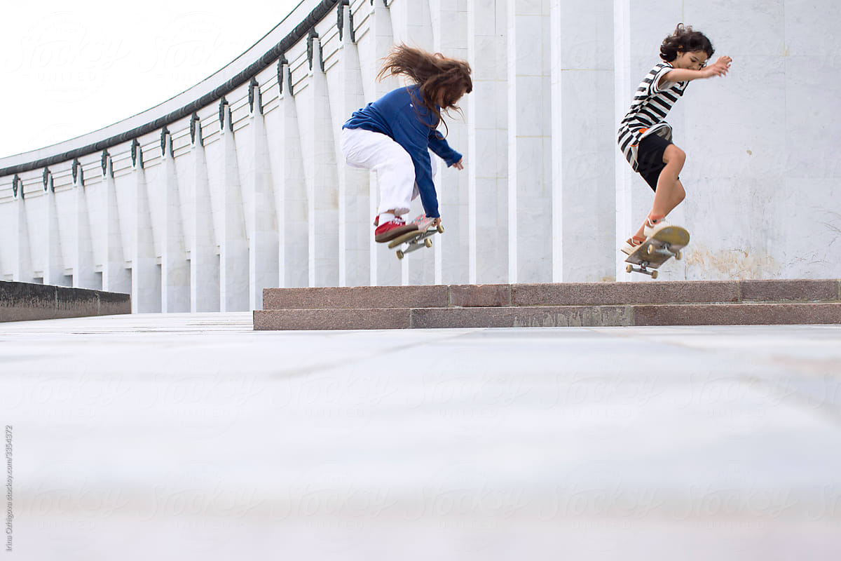 Girls skateboarders outdoors