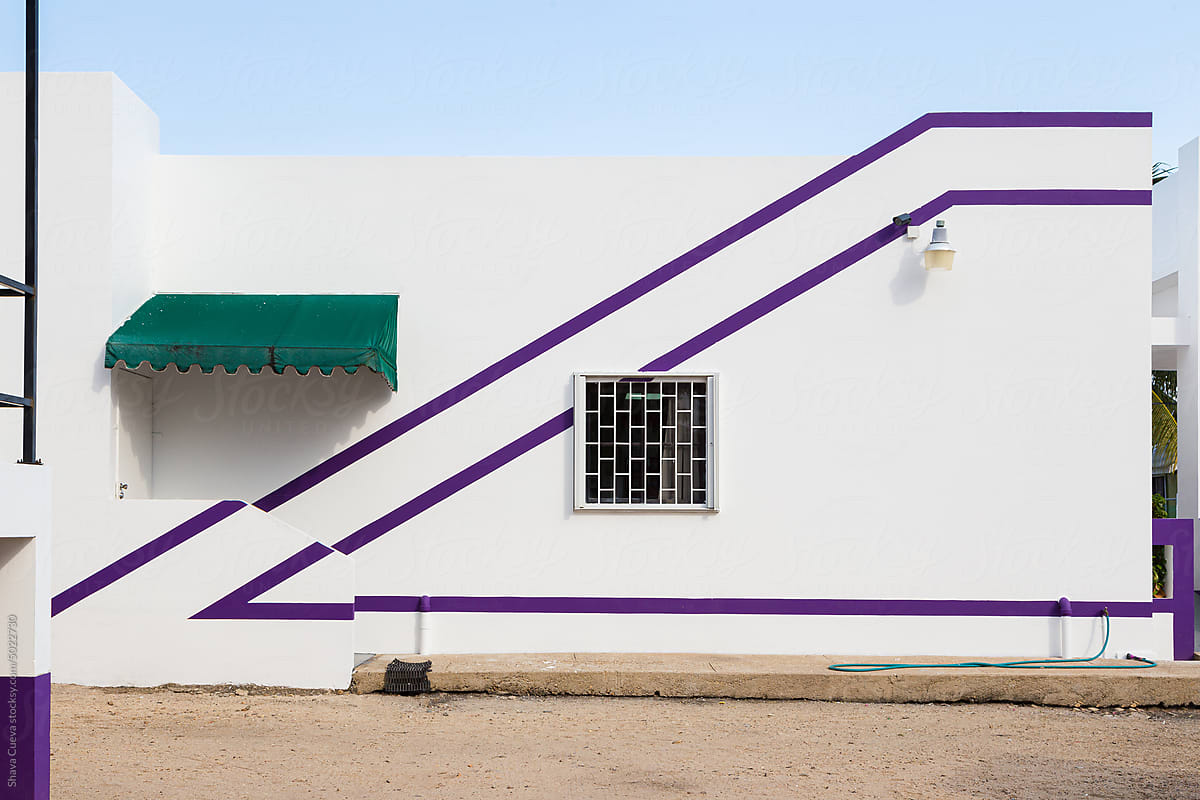 Minimalist white building with purple diagonal lines