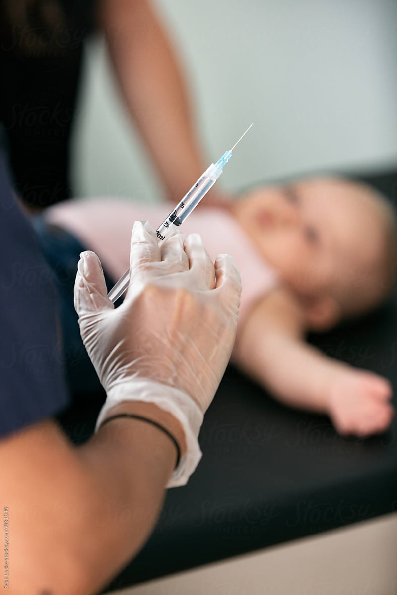Exam: Focus On Syringe Before Immunization