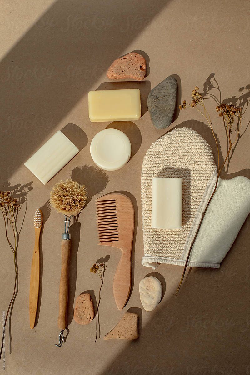 soap and brushes laid out on a craft background