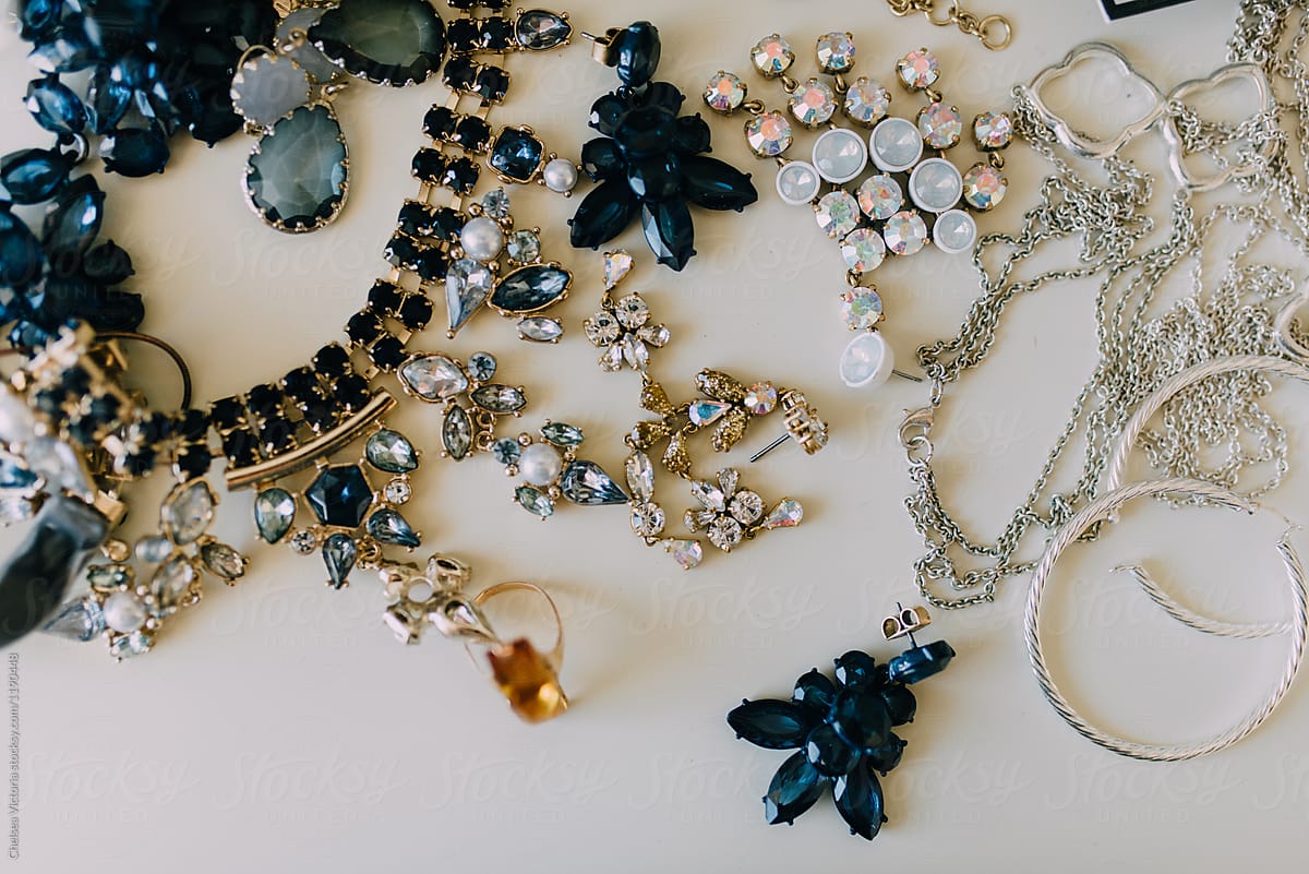 A scattered collection of jewelry
