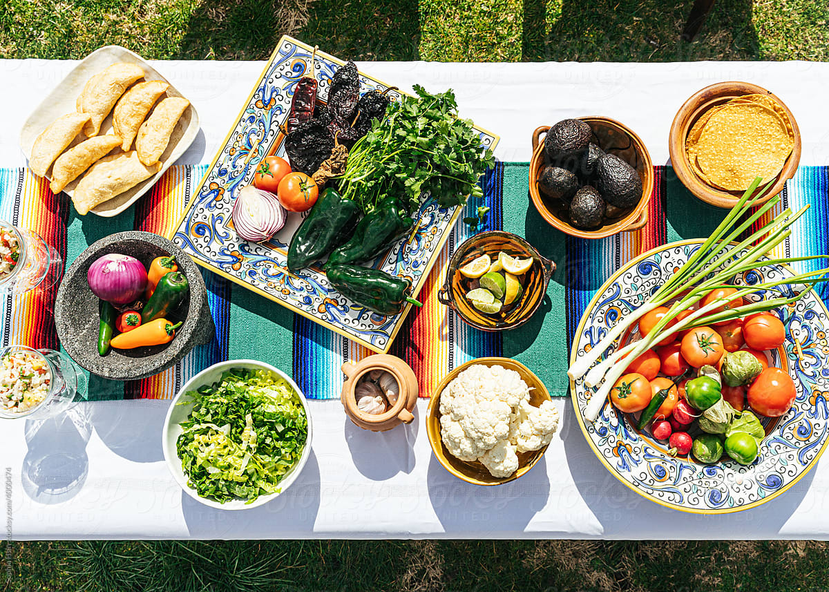 Colorful spread of quesadilla and  fresh produce