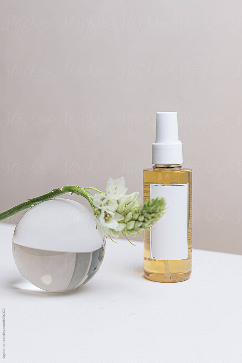 Still life of beauty product with flower