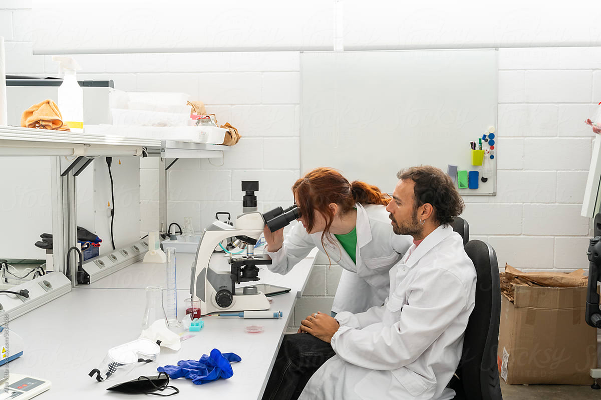 scientists working in biotech laboratory