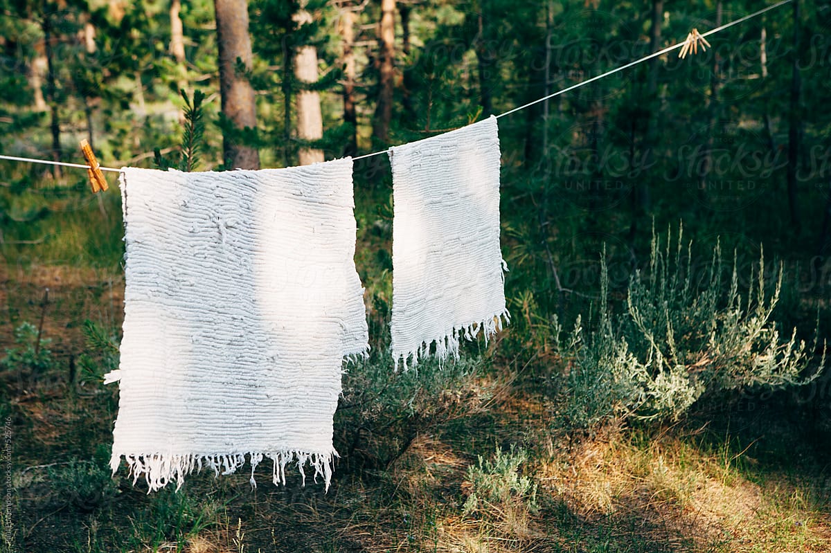 Laundry hanging to dry outside mountain cabin