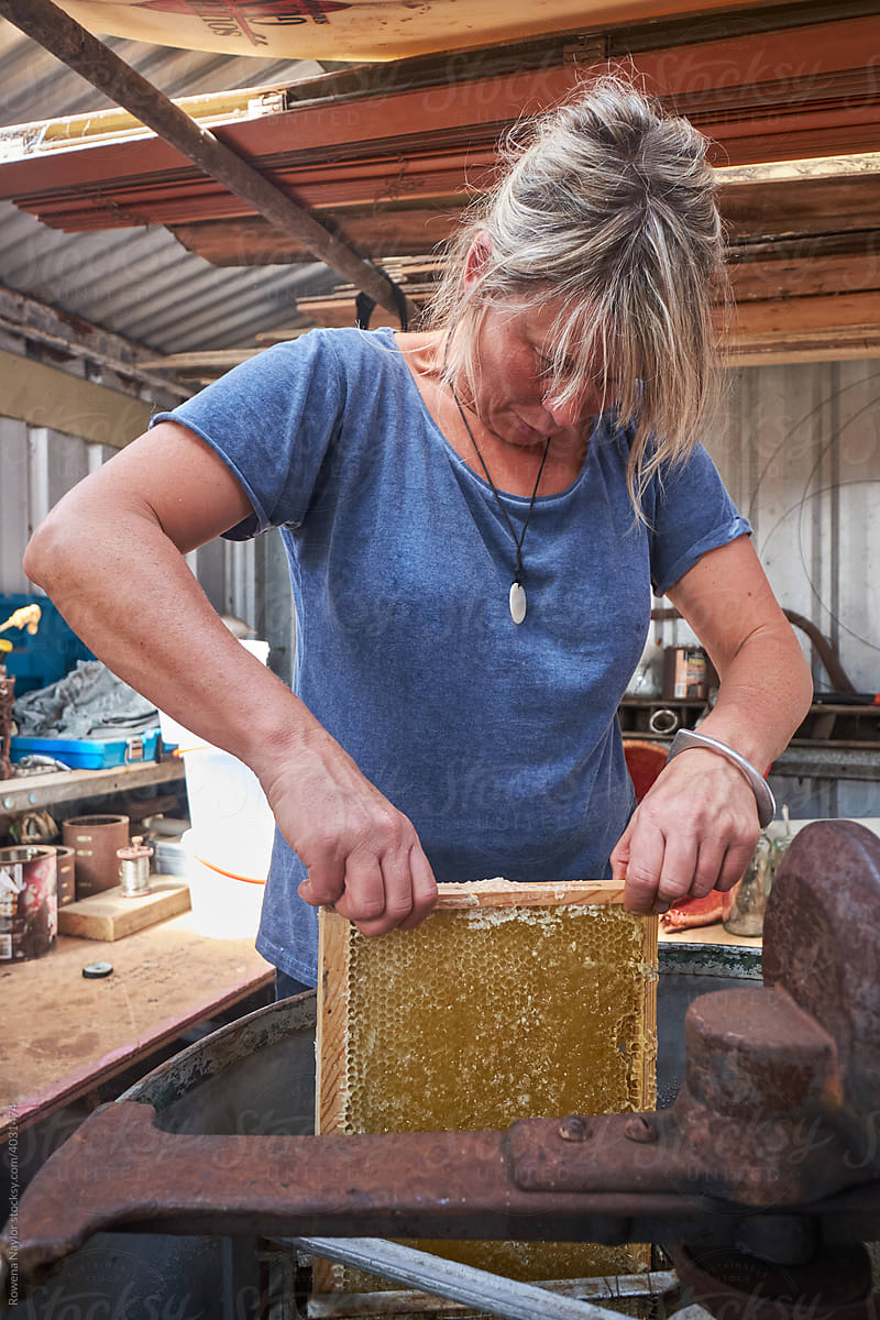 Beekeeper with honeycomb