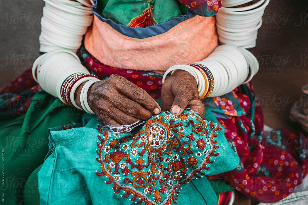 Old woman doing embroidery