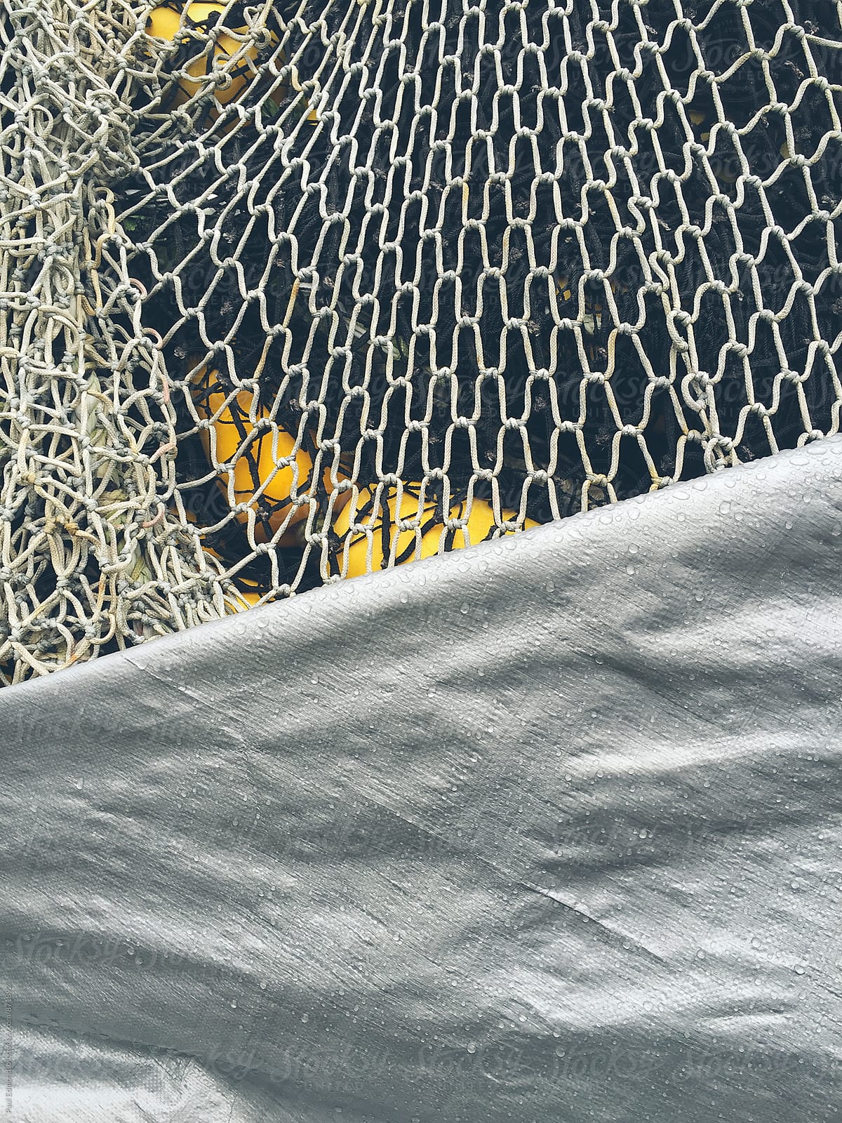 Close up of commercial fishing nets and tarp