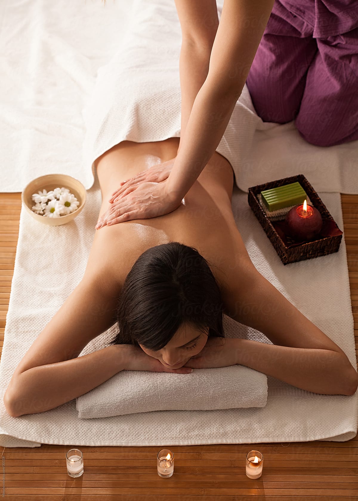 Woman Enjoying Massage In Spa Center By Stocksy Contributor Mosuno