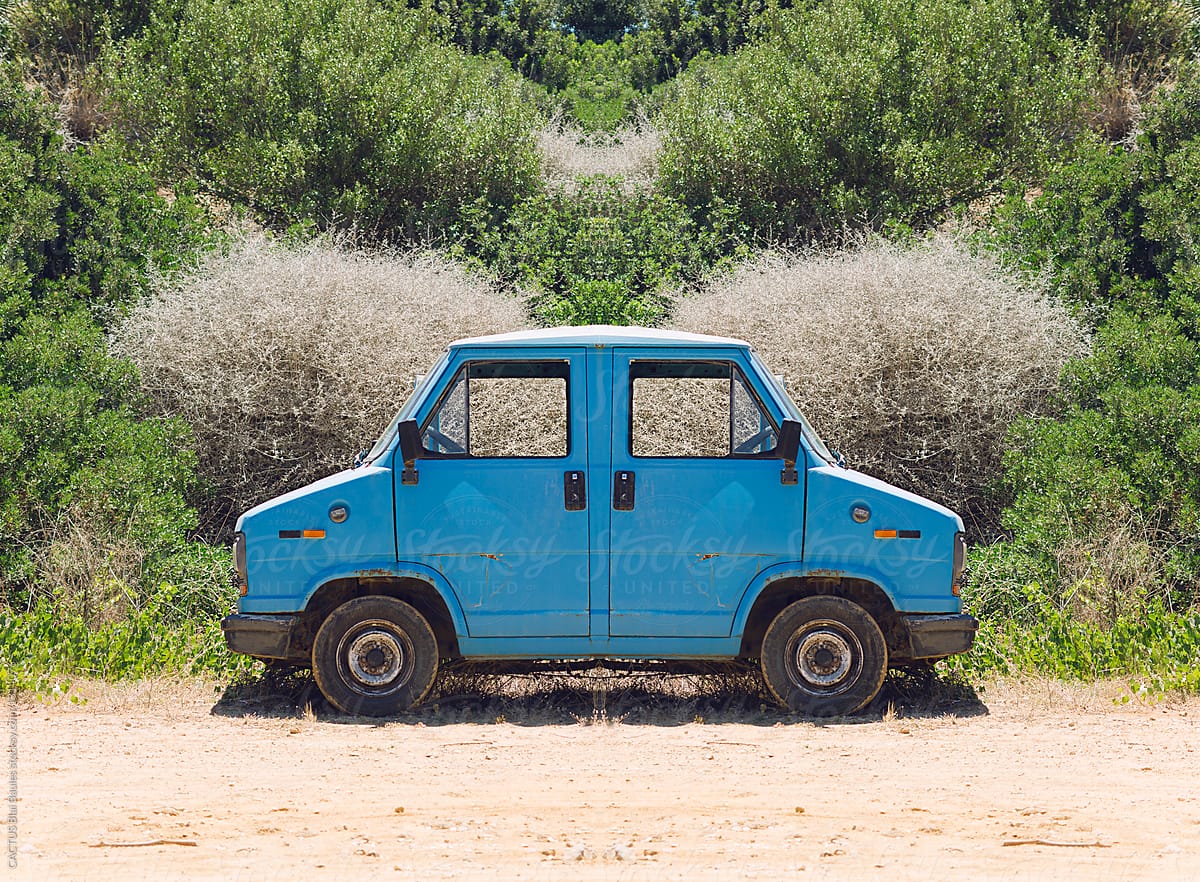 Symmetry Image Of A Trash Car by Stocksy Contributor CACTUS