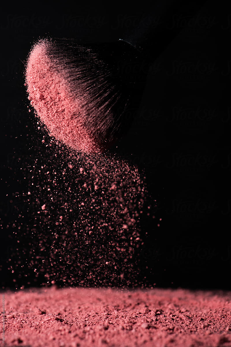 Make up brush with pink face powder