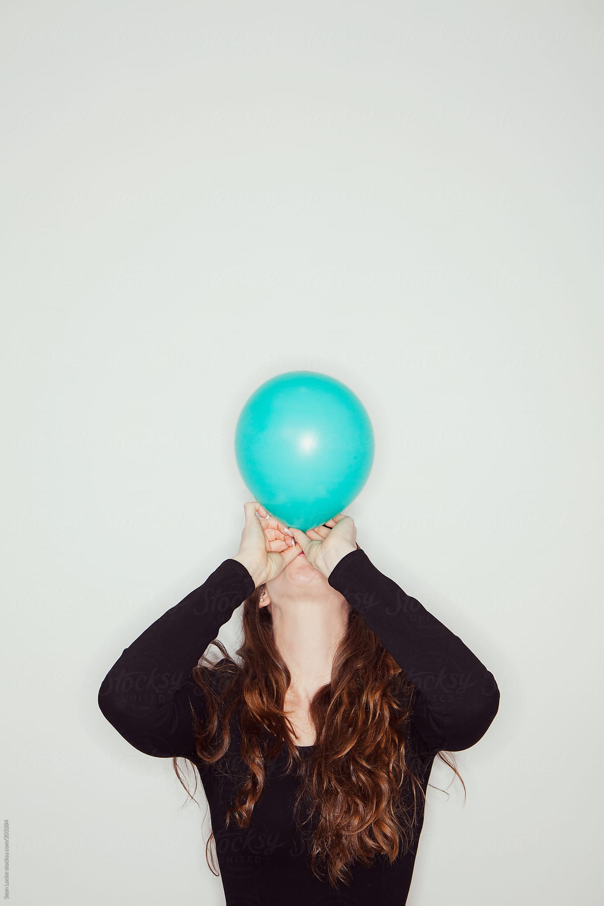 Portraits: Blowing Up A Balloon