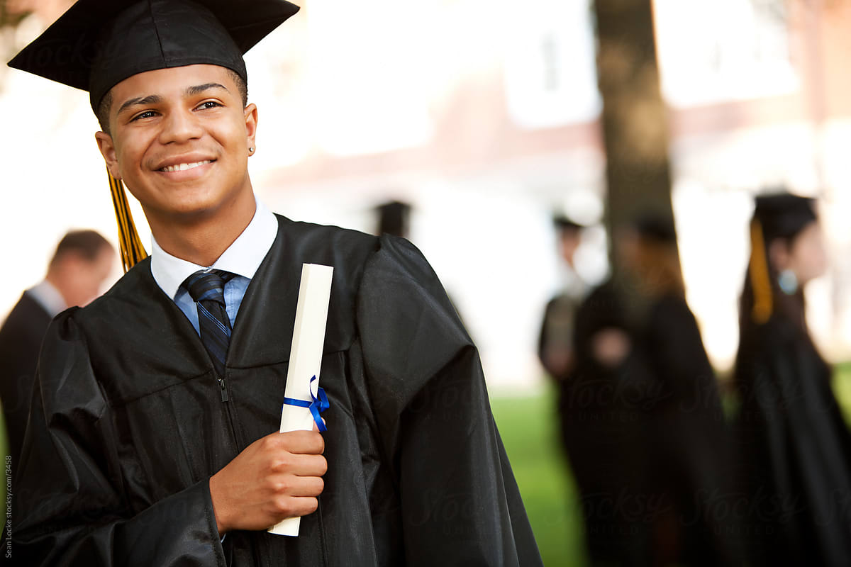 Graduation: Proud Graduate Holding Diploma and Thinking