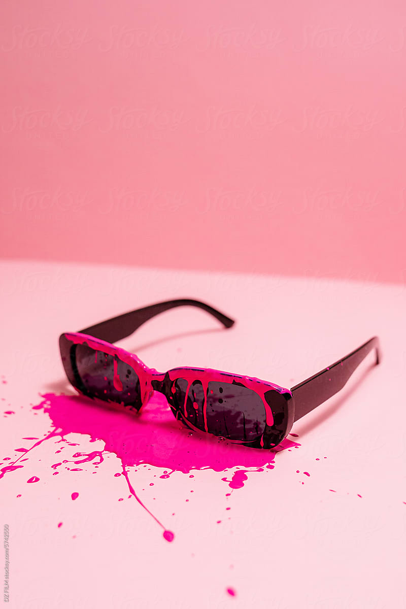 Glasses in pink paint