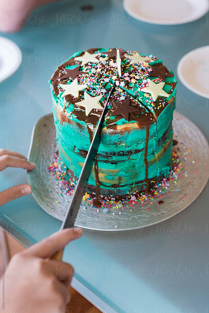 Cutting The Birthday Cake By Stocksy Contributor Gillian Vann Stocksy