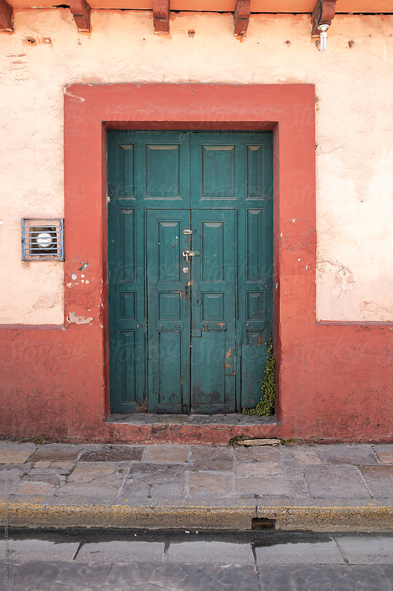 Colorful facade of colonial house in Mexico