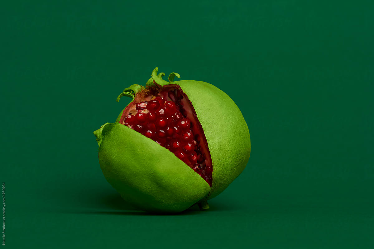pomegranate with red pulp and green rind