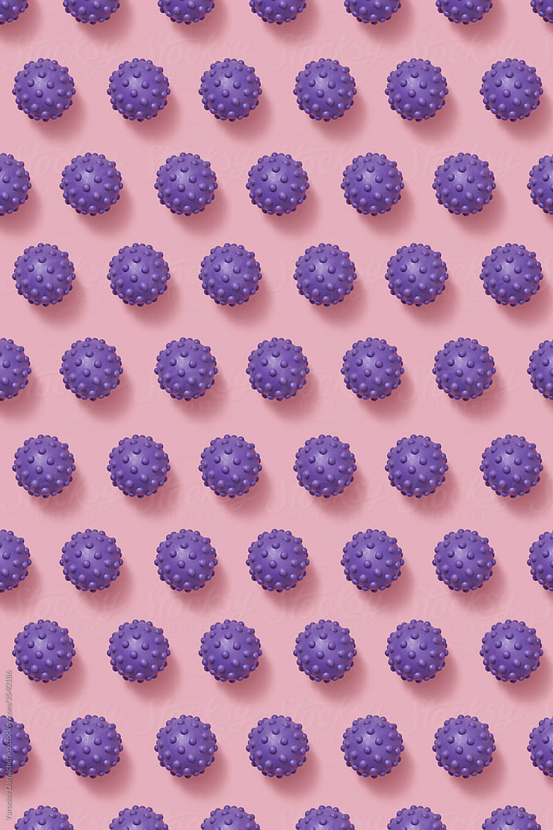 Pattern from purple colorful spiky balls toys .