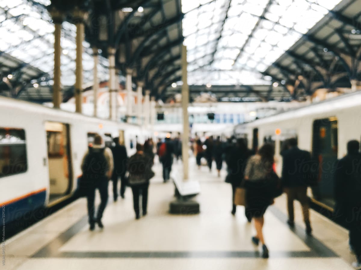 Defocused Shot of Travelers Arriving in London Railway Station